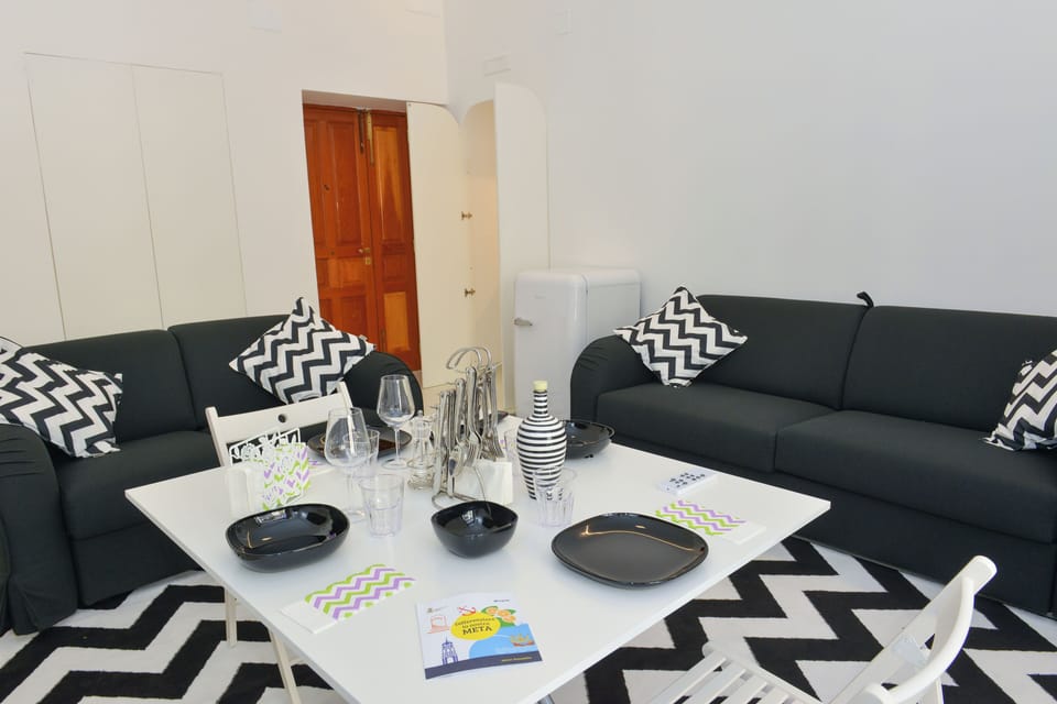 City Apartment | Living area | 65-inch Smart TV with digital channels