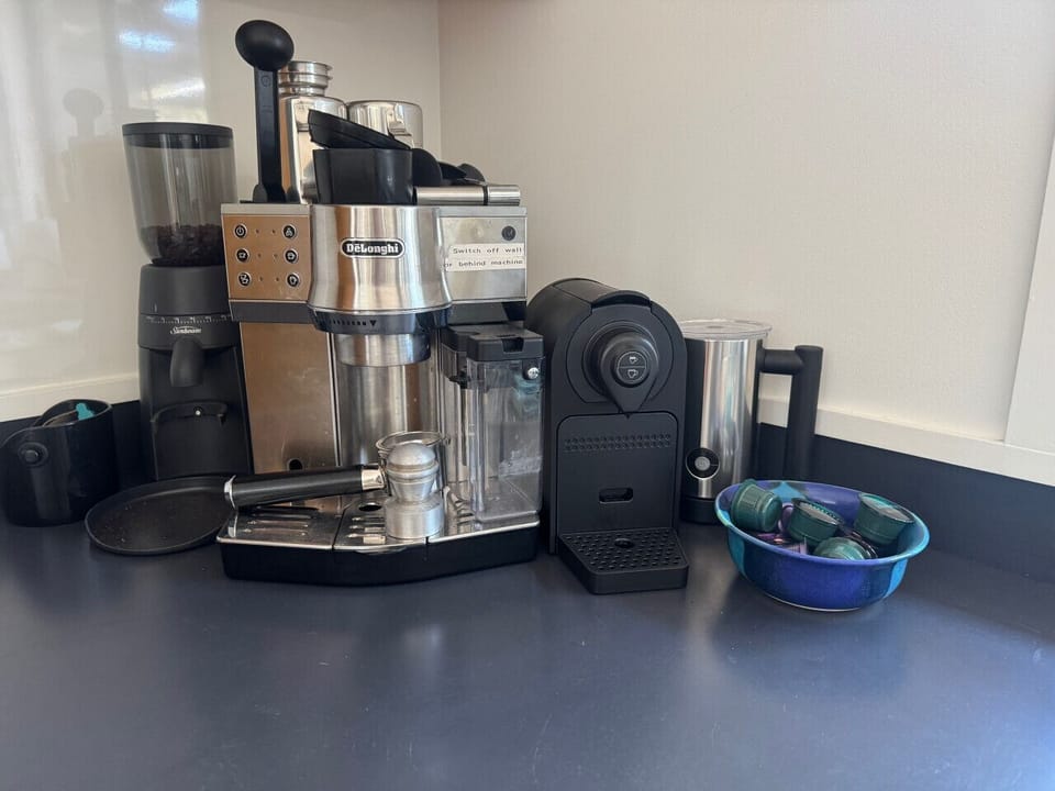 Expresso maker and grinder provided