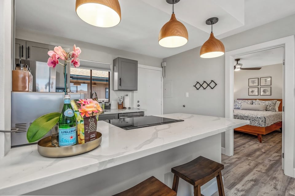 Luxury Condo | Private kitchen | Full-size fridge, microwave, oven, stovetop