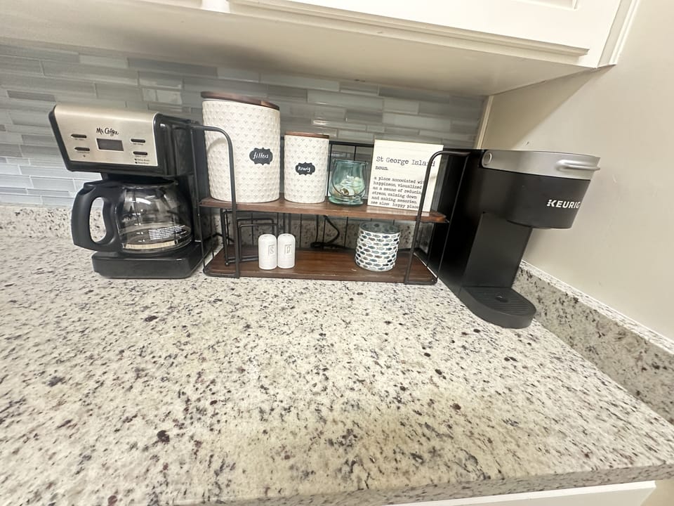Coffee bar with keurig maker.