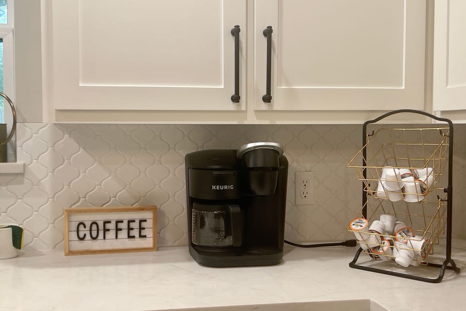 Keurig coffee station with pods provided for guests