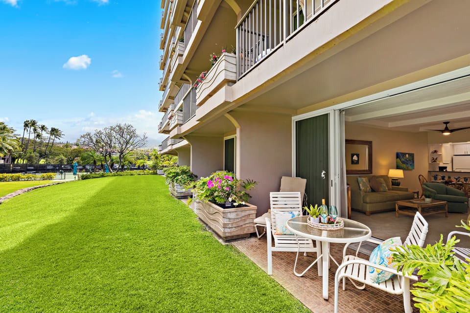 Unwind on your private ground floor lanai, where tropical landscaping and gentle island breezes create a serene retreat.