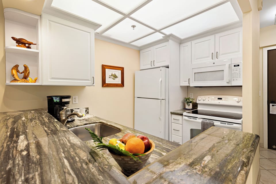 Everything you need, right at your fingertips. A fully equipped kitchen stocked with all the essentials. Perfect for cooking your favorite meals in paradise.