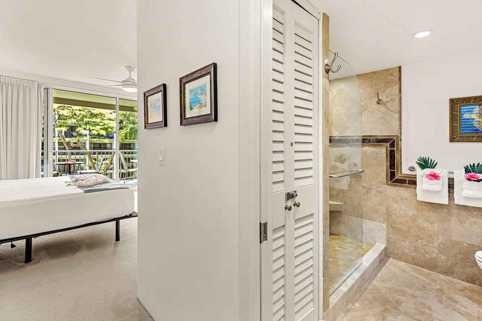 A private master bathroom designed for comfort and relaxation. Featuring elegant finishes, a spacious layout, and a calming atmosphere to start and end your day in island style.