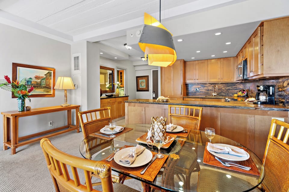 Gather around the dining table for morning coffee, a casual breakfast, or a shared meal after a day on Kāʻanapali Beach. The open-concept design provides a welcoming space to relax, dine, and enjoy quality time together.