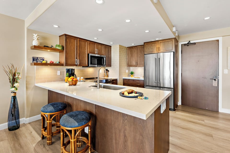 Create memorable meals in this beautifully renovated gourmet kitchen, featuring modern appliances, expansive countertops, and a spacious island perfect for gathering. Designed with both style and functionality in mind, this inviting space makes dining in a