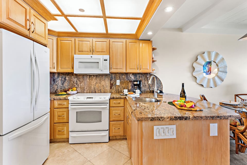 Prepare everything from quick breakfasts to gourmet dinners in the fully equipped kitchen, featuring ample counter space and all the essentials for your Maui getaway.