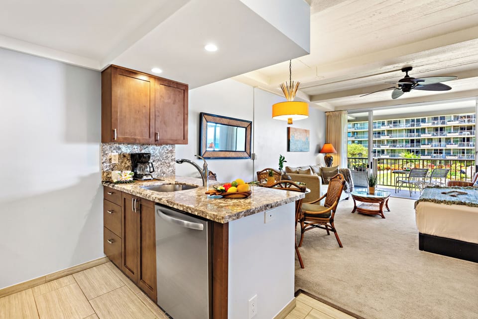 Fully equipped kitchen with a generous breakfast bar, comfortable seating, and modern appliances. Ideal for casual dining or enjoying your morning coffee before a day in paradise.