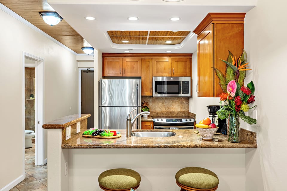 Cook with ease in a thoughtfully designed, fully equipped kitchen. Featuring modern appliances, ample counter space, and all the essentials you need, from quick island breakfasts to full home-cooked dinners.