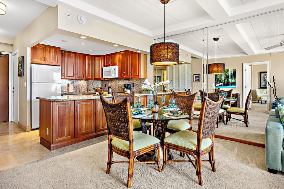 Gather around the dining table for memorable meals, game nights, or planning your next Maui adventure in this warm and welcoming space.