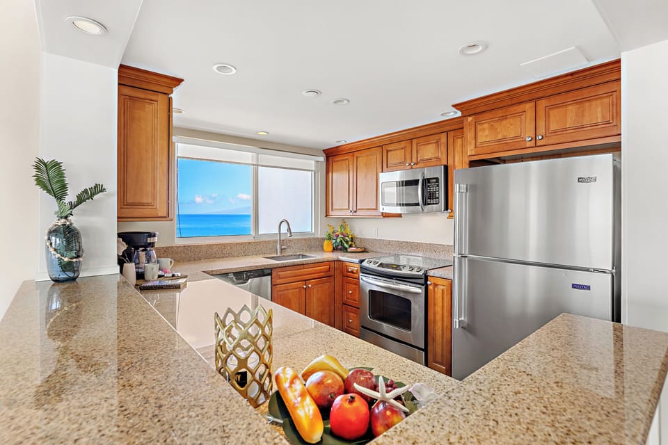 Cook with ease in a thoughtfully designed, fully equipped kitchen. Featuring modern appliances, ample counter space, and all the essentials you need, from quick island breakfasts to full home-cooked dinners
