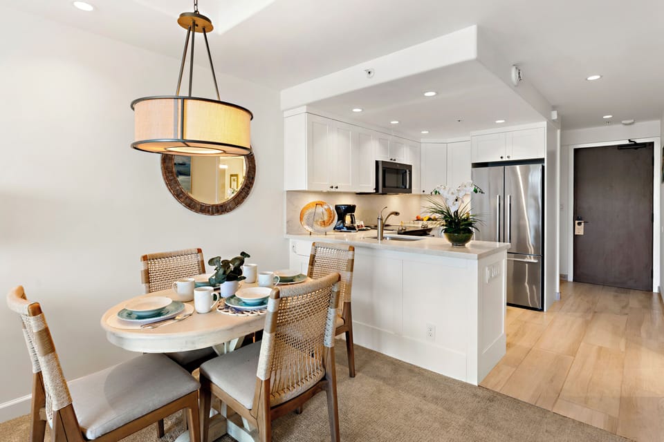 A bright, modern kitchen and dining space thoughtfully designed for relaxed island living and effortless entertaining.