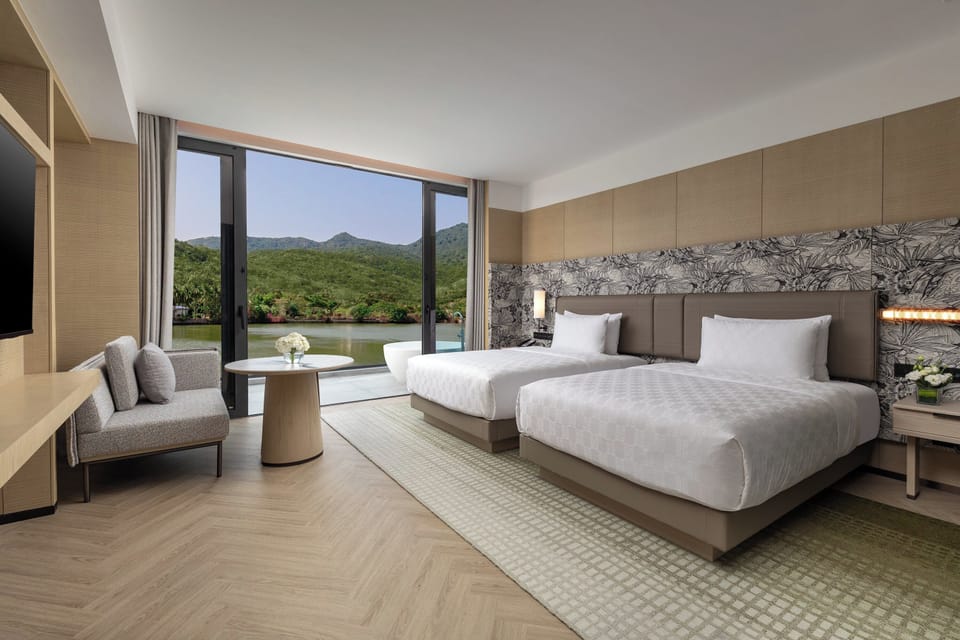 Exclusive Room, Multiple Beds (Shanhai) | Down comforters, minibar (free items), in-room safe, laptop workspace