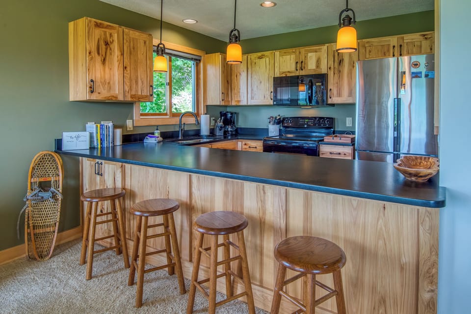 A breakfast bar and open concept means more time together!