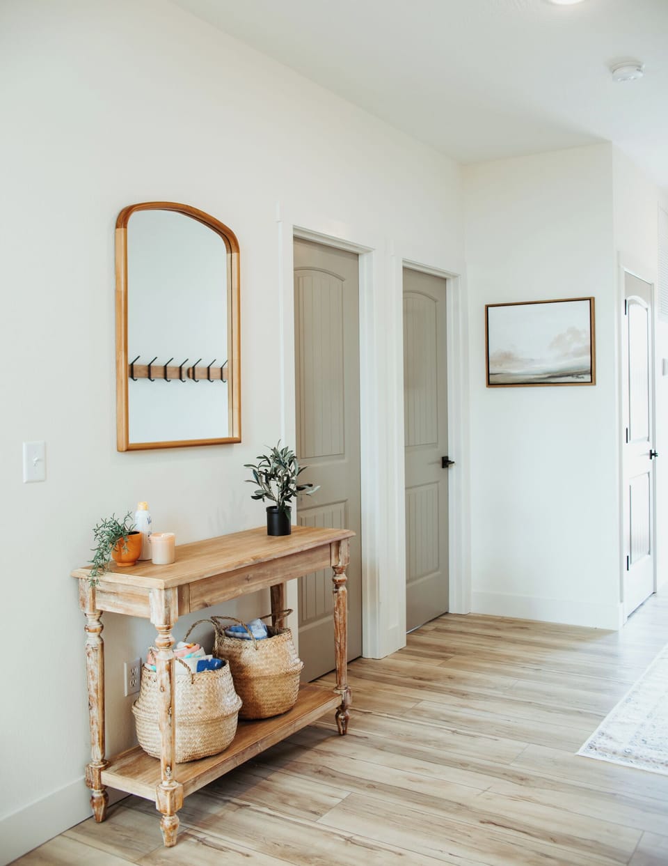 Entryway hall, with a half bathroom 