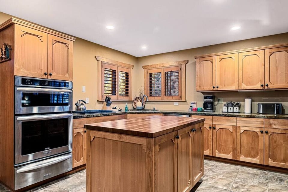 Fully stocked gourmet kitchen has everything you need to make a memorable meal.  A true chef`s dream with an island - gather around and cook for your family and friends!