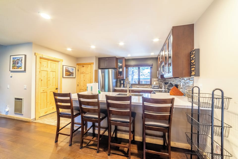 Fully Stocked Kitchen with Bar Seating