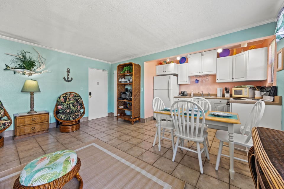 Living room and the kitchen.
Two comfortable swivel rocking chairs