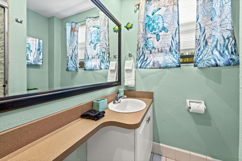 Full bathroom, plenty space for guests to unpack toiletries 