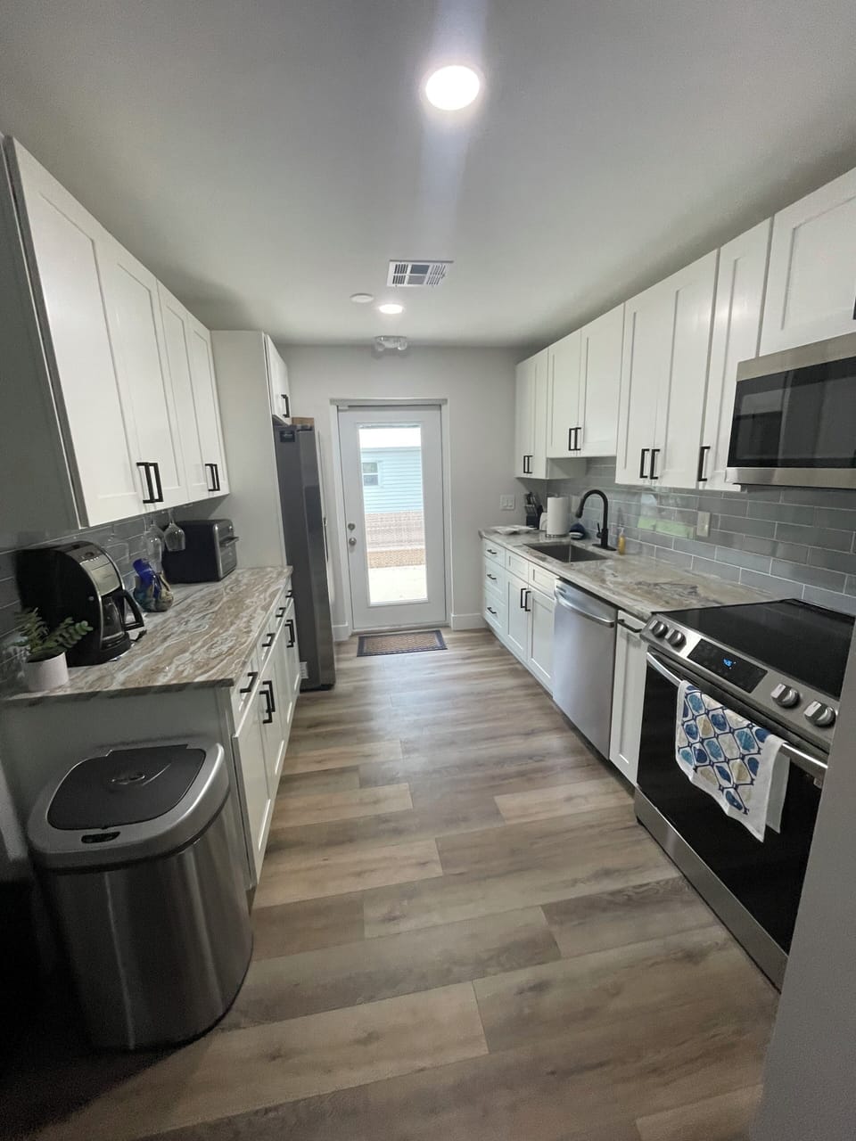 Kitchen, Stove, Cook top, Microwave, Air fryer, Coffee maker with bean grinder