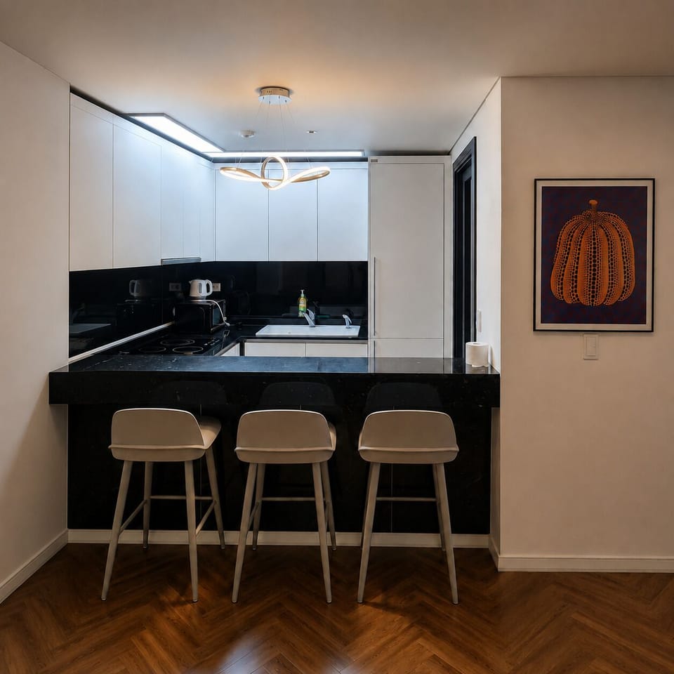 Premium Suite, Multiple Beds | Living area | 43-inch flat-screen TV with cable channels