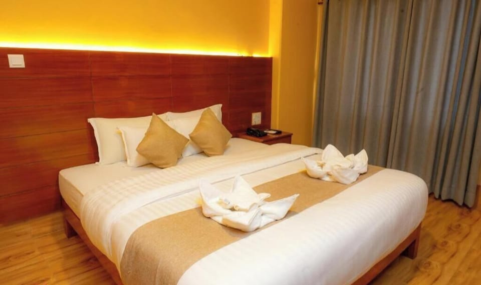 Premium bedding, in-room safe, laptop workspace, soundproofing