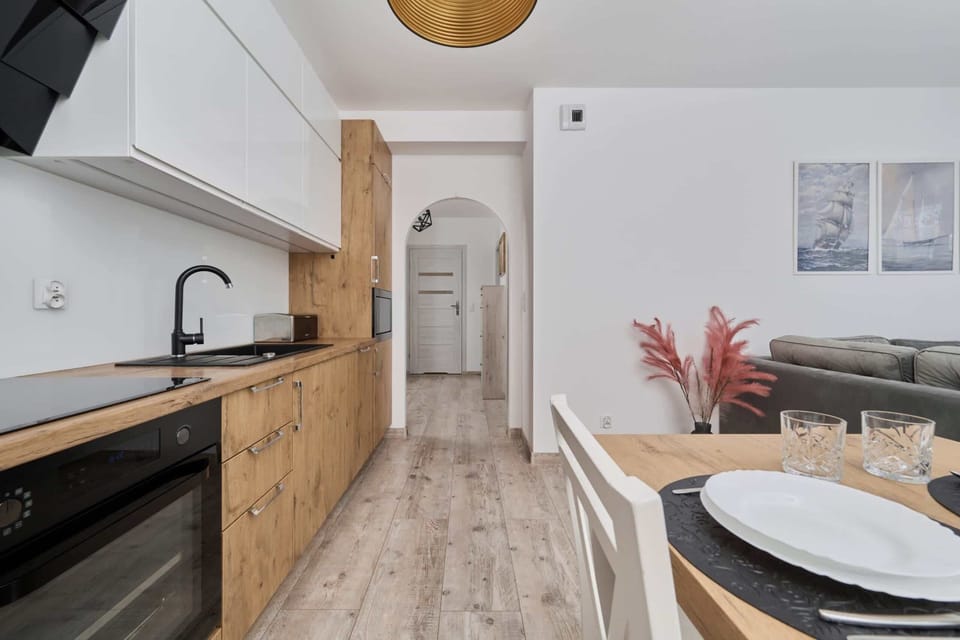 Cook and dine in style with the modern kitchenette and dining area.