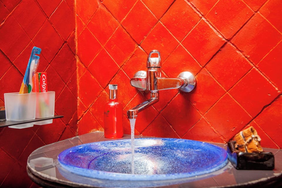 Shower, rainfall showerhead, designer toiletries, hair dryer