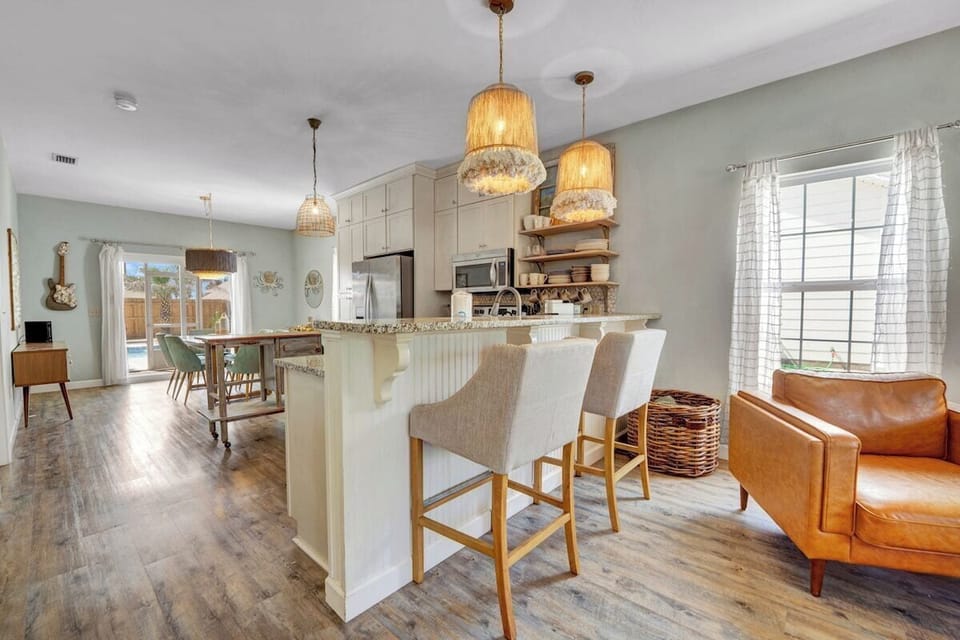 Kitchen and bar area with seating