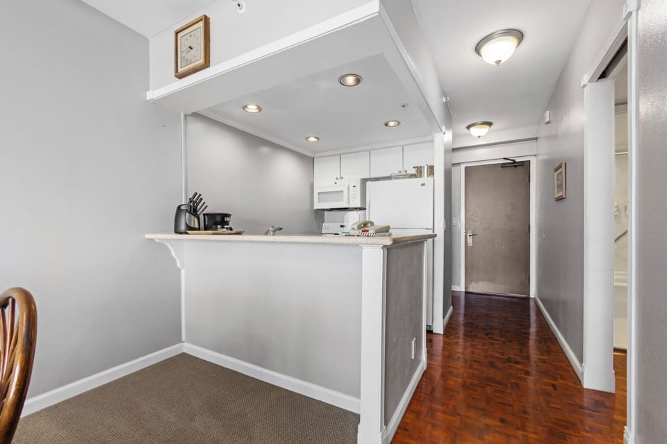 Step into your bright, welcoming space with a fully equipped kitchen ready for your culinary adventures. Modern conveniences meet classic charm in this thoughtfully designed retreat.
