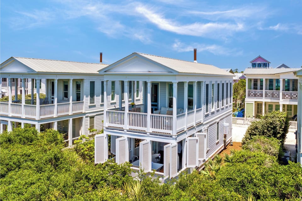 You'll enjoy 2 large covered porches from your living room and primary bedroom.