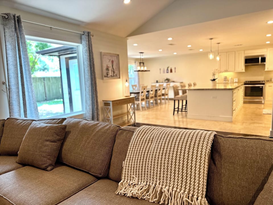 Living room opens to kitchen perfect for gathering.