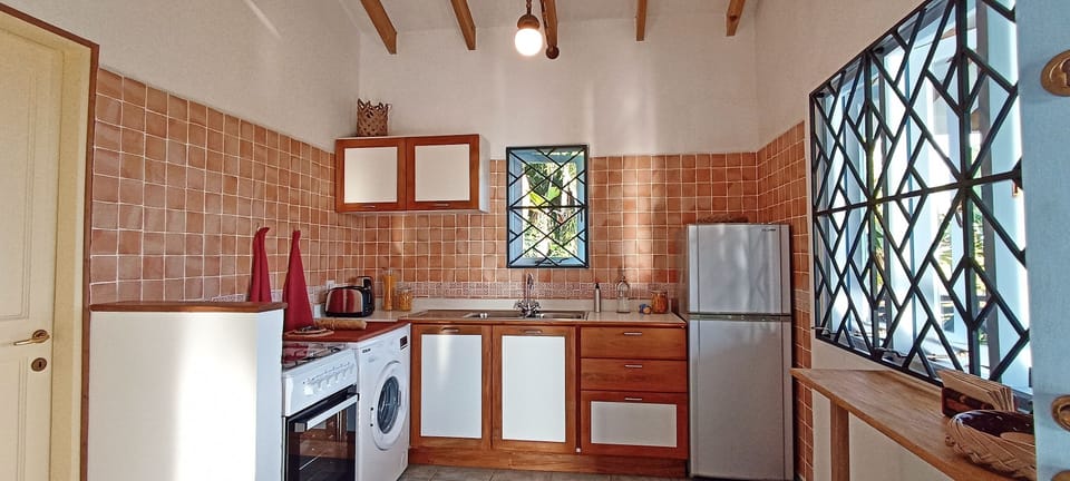 Fully equipped kitchen for romantic meals at the villa.