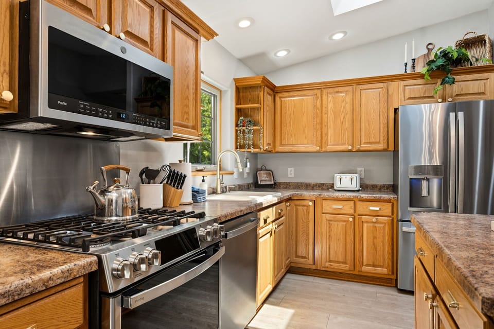 Whether you're preparing a family feast or enjoying takeout from your favorite local restaurant, this welcoming space is designed for effortless entertaining.