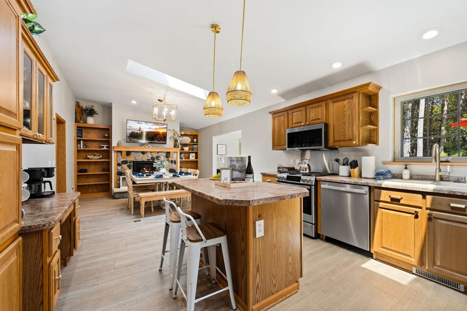 Warm wood tones, inviting gathering spaces, and thoughtful design create the perfect backdrop for making memories in Door County.
