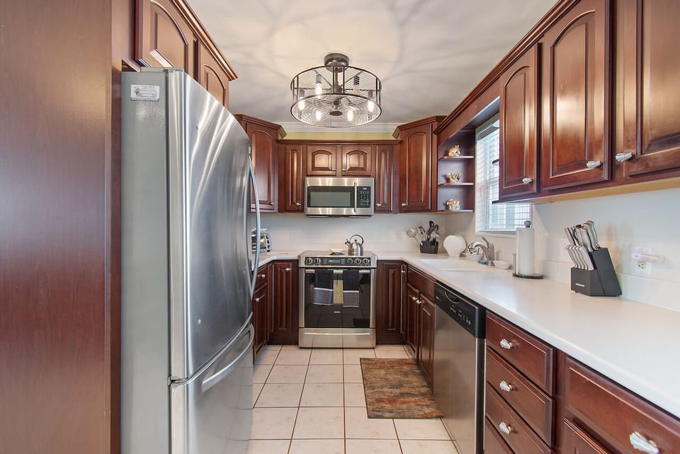 Kitchen View: Freezer has extra-large bin for additional ice and frozen foods.