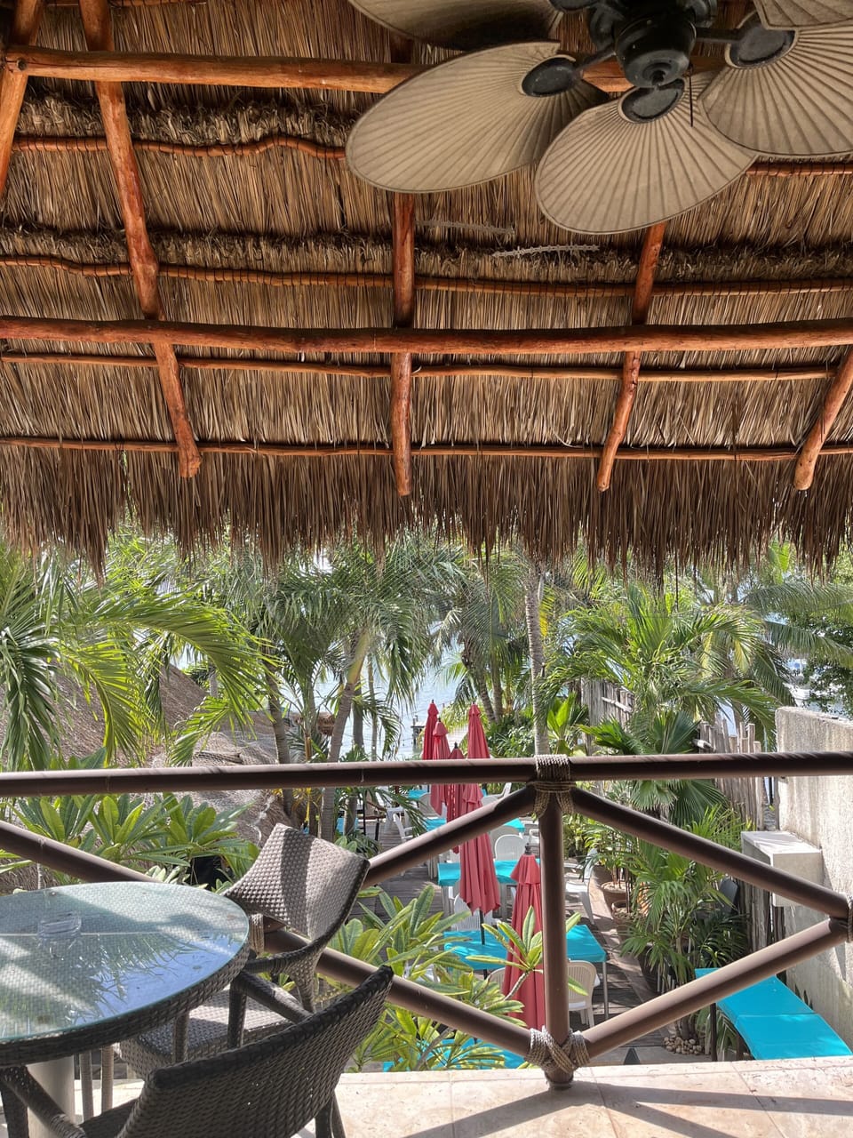 Comfortable seating on your private balcony overlooking the bay.
