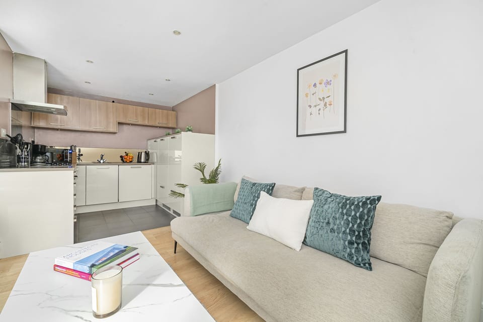 City Apartment | Living area | 40-inch flat-screen TV with satellite channels