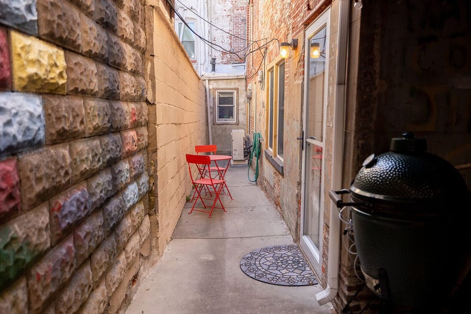Our back patio has a Big Green Egg AND a Weber Gas Grill 