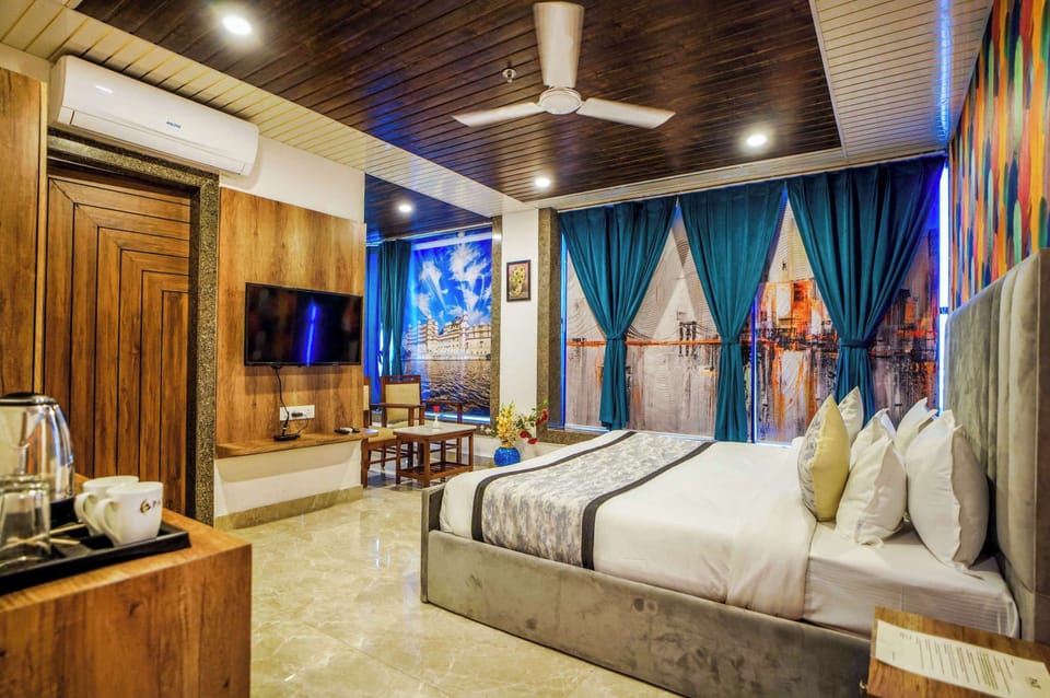 Superior Room | Living area | 32-inch Smart TV with satellite channels