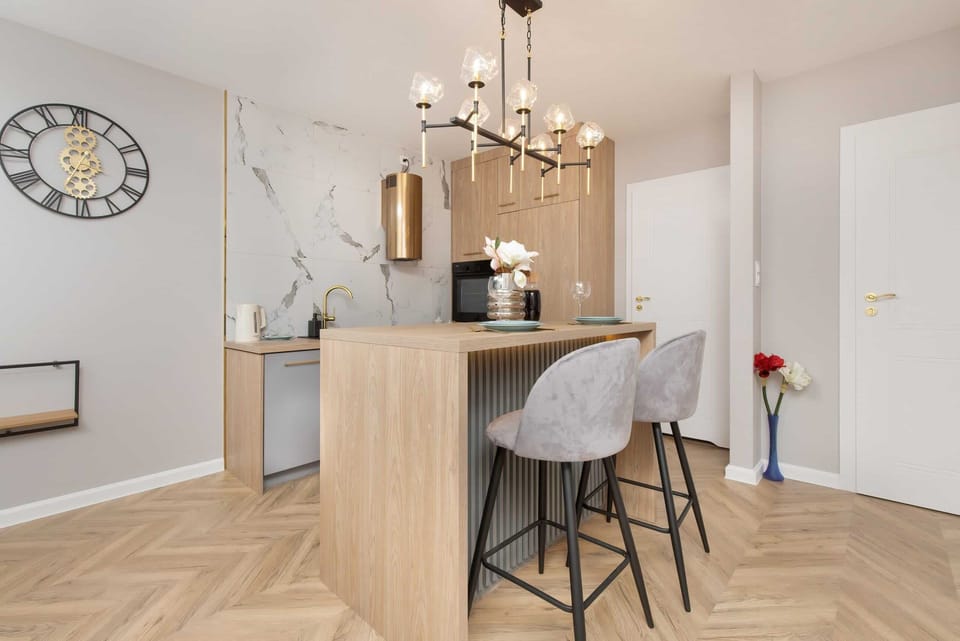 The living area's modern and stylish decor creates a welcoming atmosphere. 