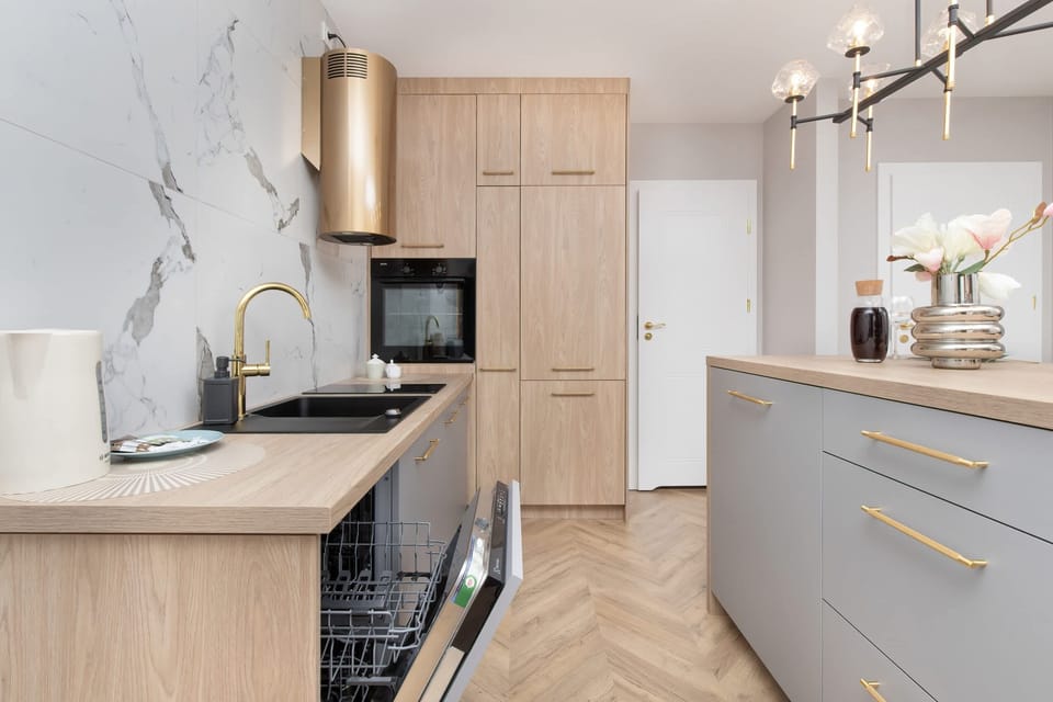 The kitchenette's practical layout maximizes space and functionality.