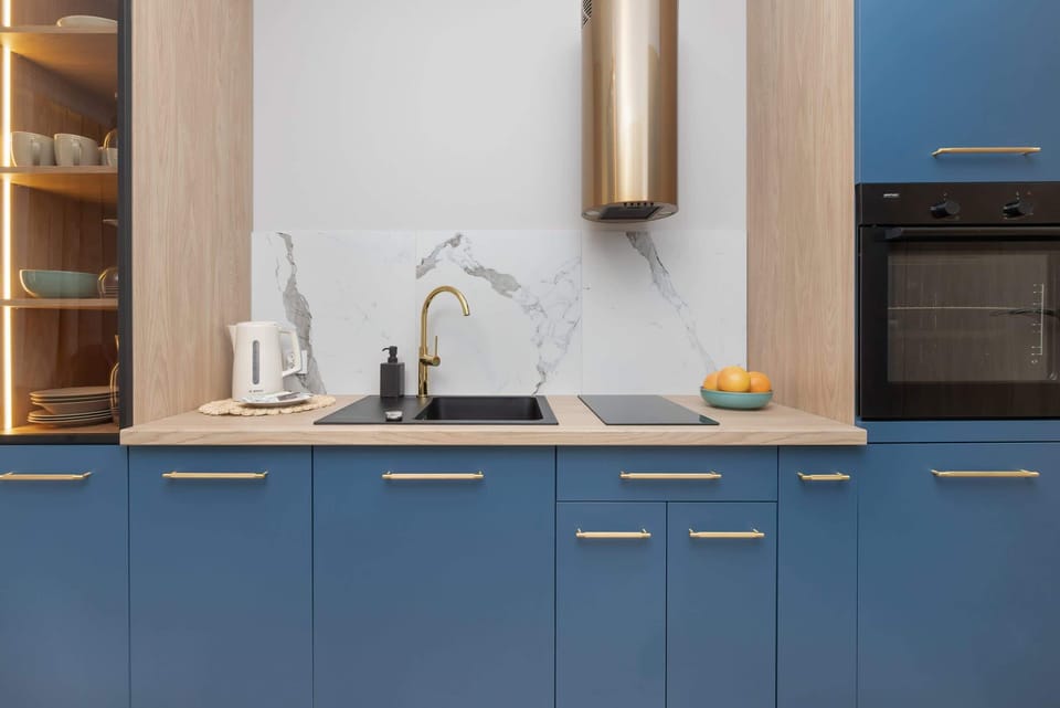 The fully equipped kitchenette includes everything you need for a home-cooked meal.