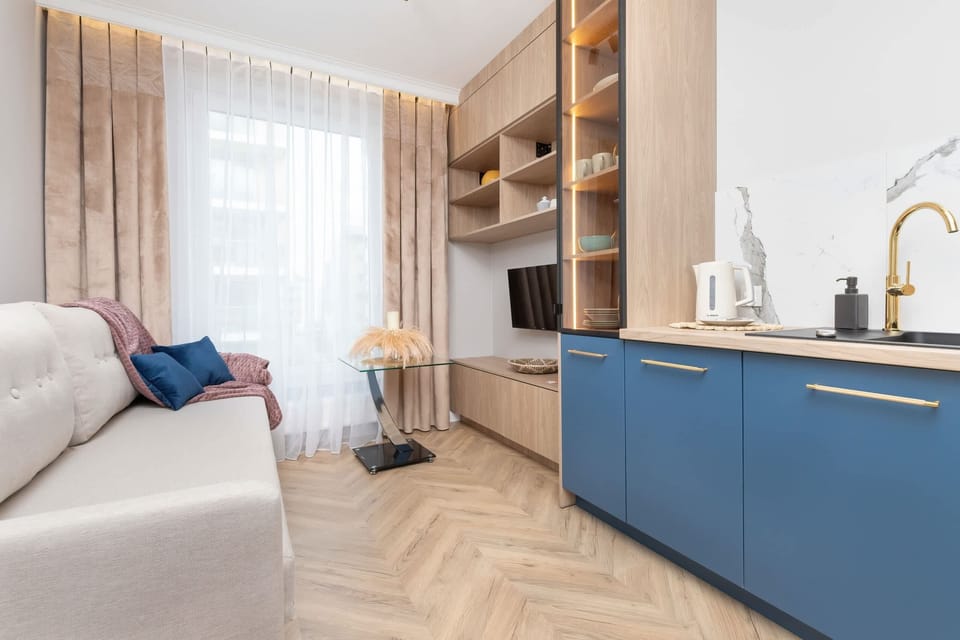 The living area's sleek design is both functional and aesthetically pleasing.