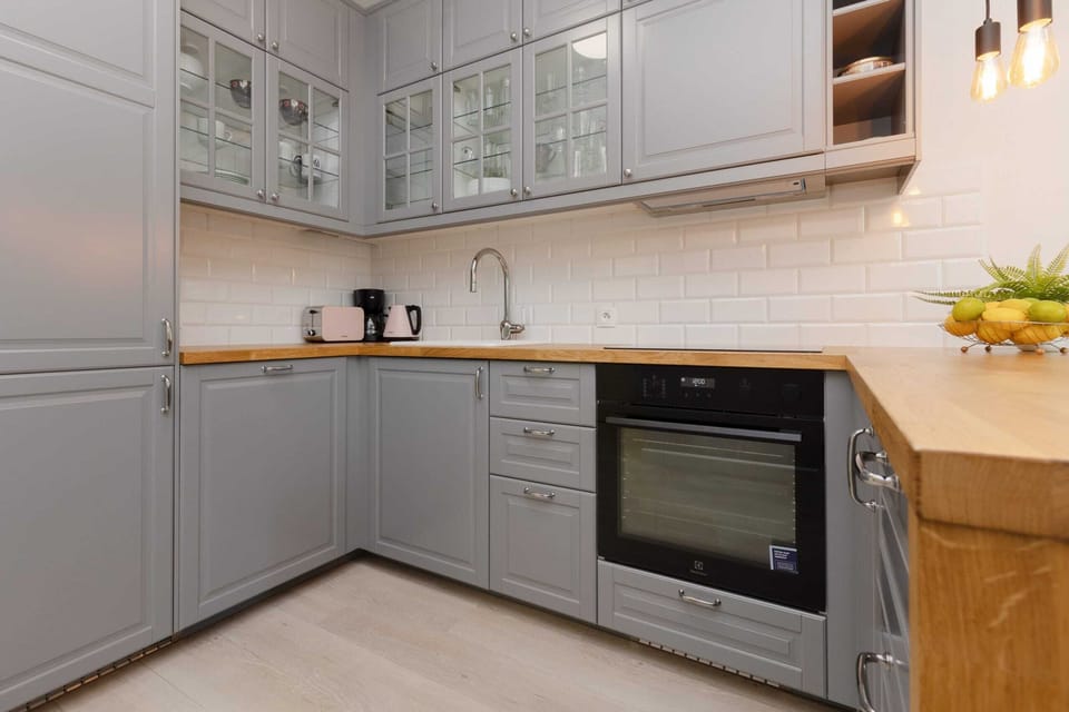 The fully equipped kitchenette includes everything you need for a home-cooked meal.