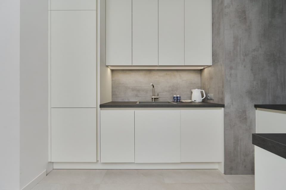 The fully equipped kitchenette includes everything you need for a home-cooked meal.