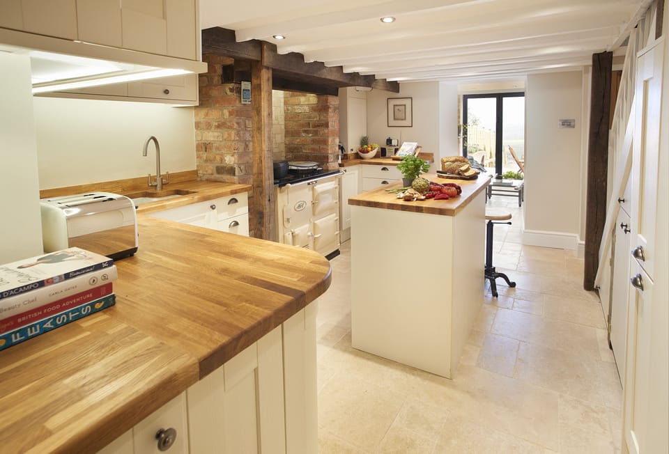 Lower ground floor:  The kitchen flows through to the light and airy garden room