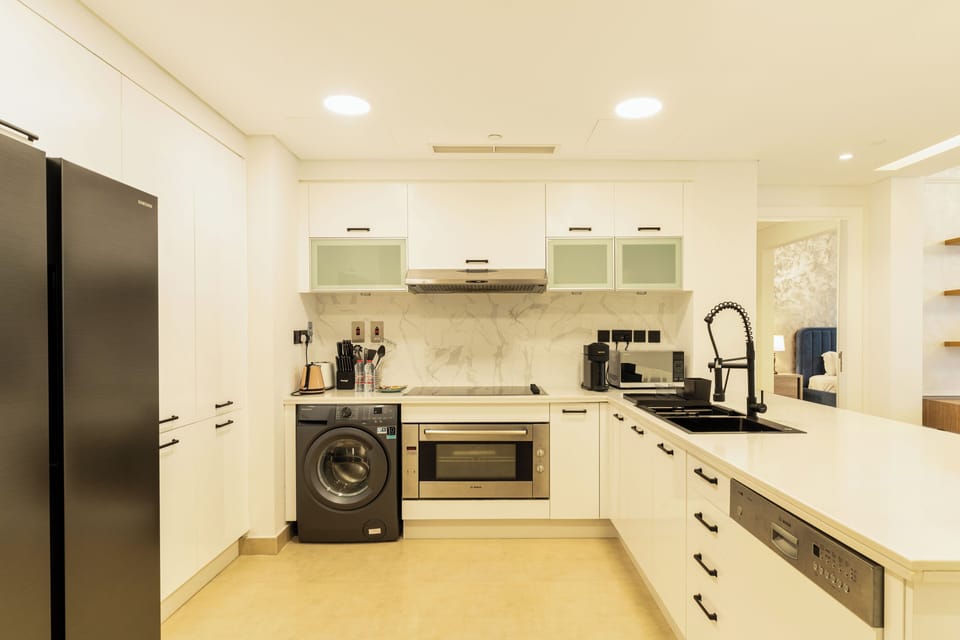 Luxury Apartment | Private kitchen | Fridge, microwave, oven, stovetop