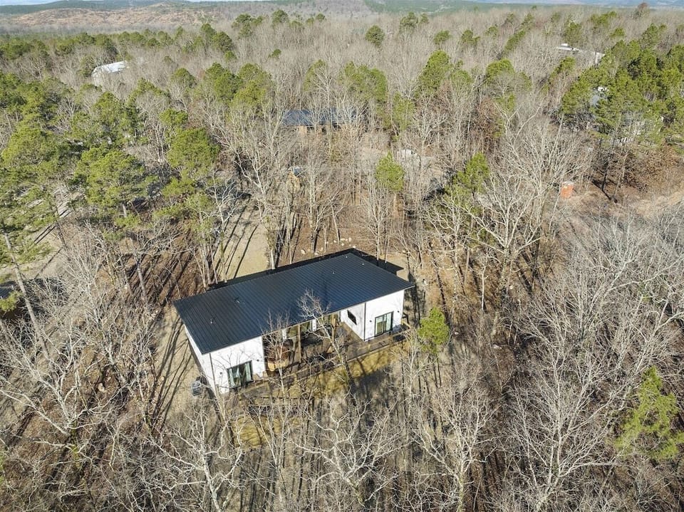Exterior: Nestled in nature, this retreat offers serene views and a spacious outdoor vibe!