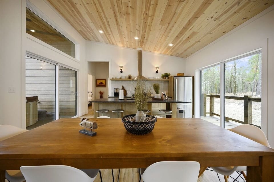 Dining Area: Gather around the rustic table and enjoy meals with nature as your backdrop!